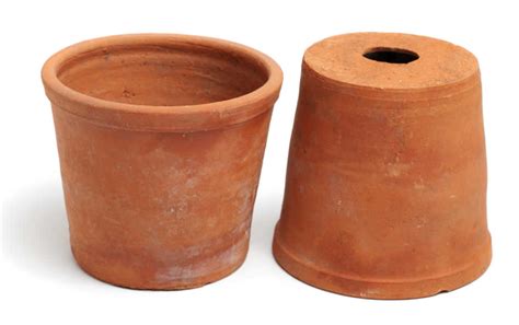 hole planter|4 pots with drainage holes.